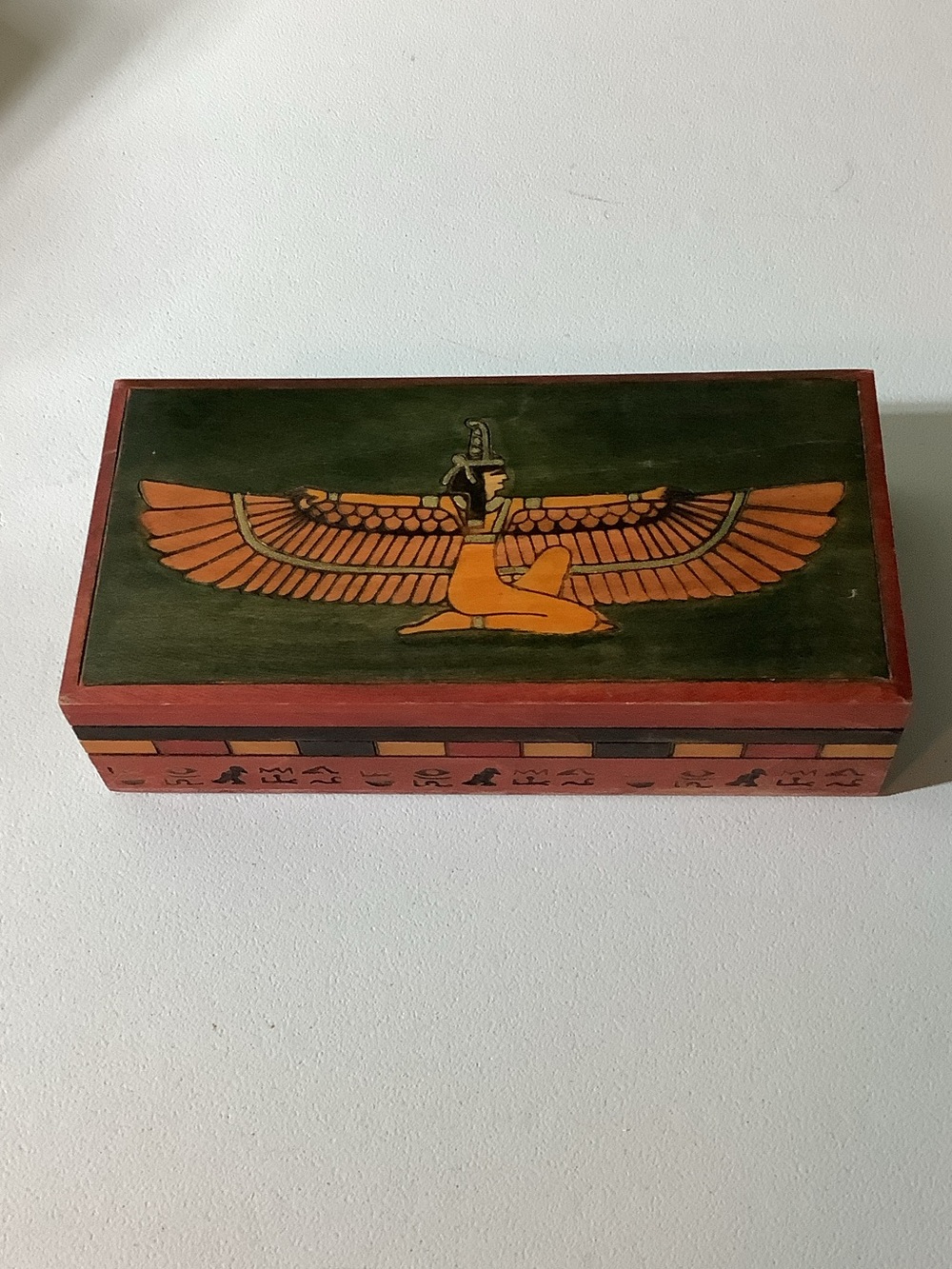 Wooden Egyptian box featuring Isis